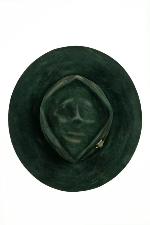 hat with green color blur over black base